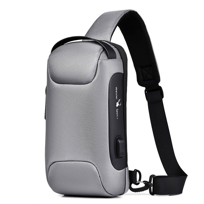 Bolsa masculina de viagem transversal de ombro, versátil e antifurto. Material à prova d'água. Conexão USB para carregamento via powerbank.